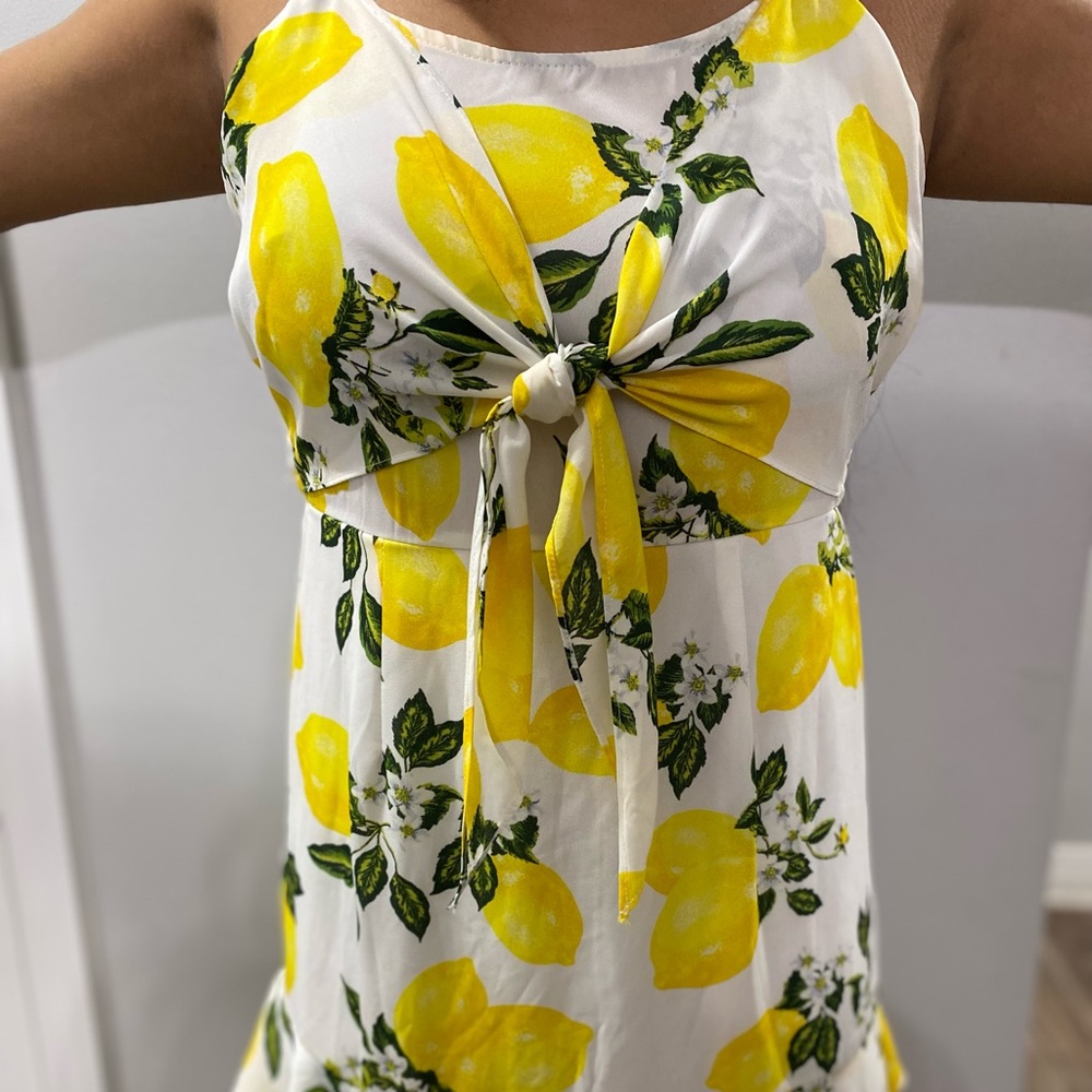 White dress with lemons and white flowers
